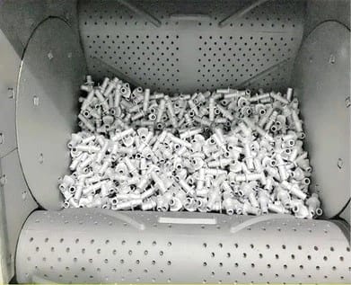 Grenailleuse à tablier retourneur